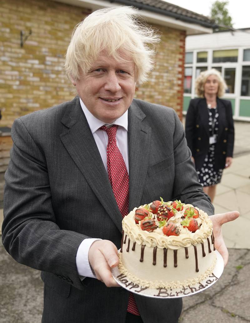 The prime minister, pictured with a birthday cake baked for him by school staff at Bovingdon Primary Academy in Hemel Hempstead, said it ‘didn't occur’ to him that a gathering on June 19, 2020, to mark his 56th birthday broke coronavirus rules. AFP