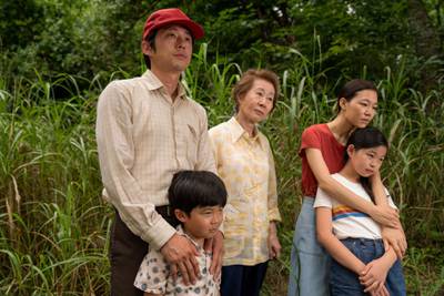 This image released by A24 shows, from left, Steven Yeun, Alan S. Kim, Yuh-Jung Youn, Yeri Han, and Noel Cho in a scene from "Minari."  (Josh Ethan Johnson/A24 via AP)