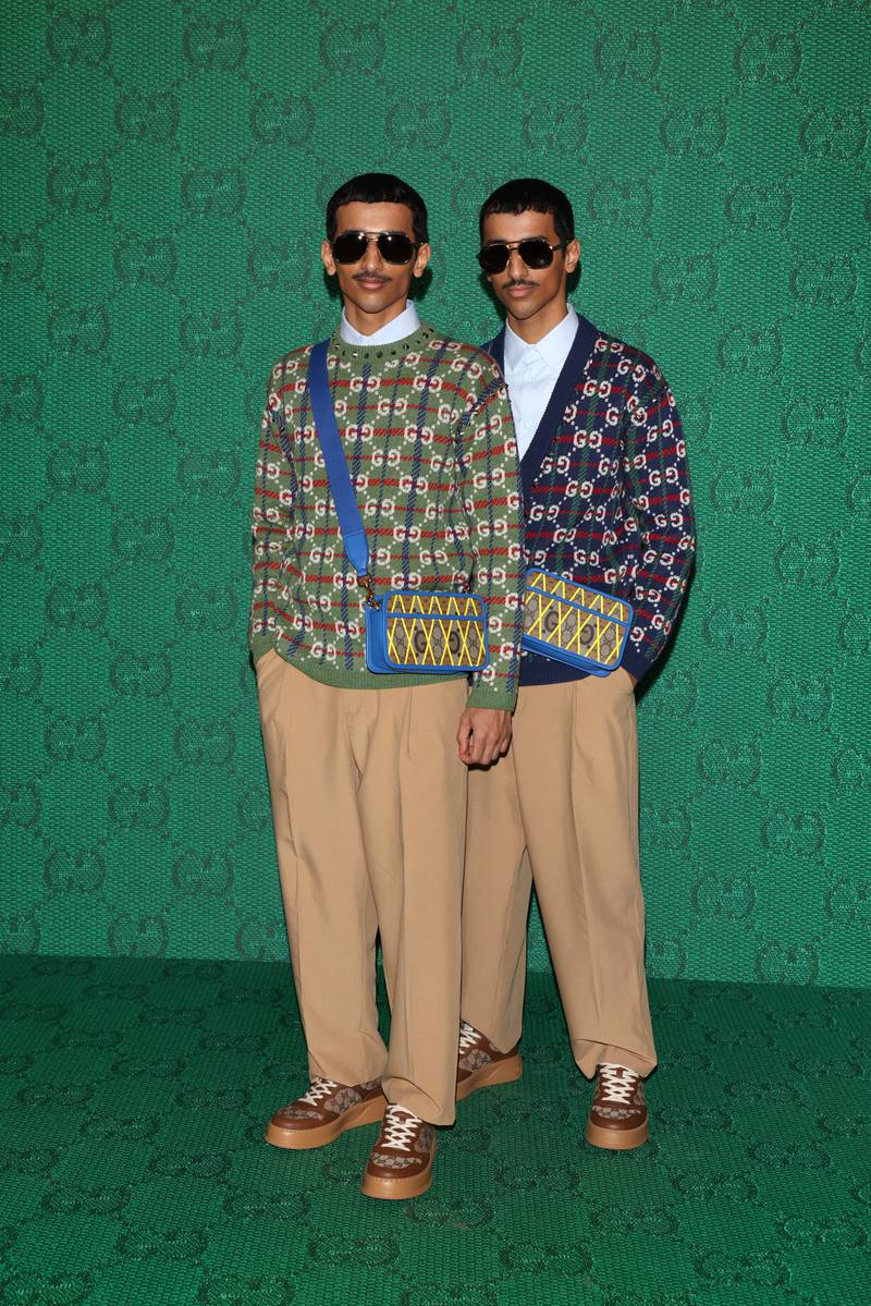 The twins at the Gucci show. Getty Images
