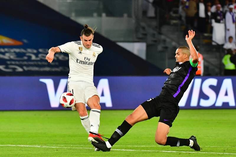 December 2018: Al Ain defender Ismail Ahmed (R) battles for the ball with Real Madrid's Gareth Bale during the Fifa Club World Cup final. Real won 4-1. AFP