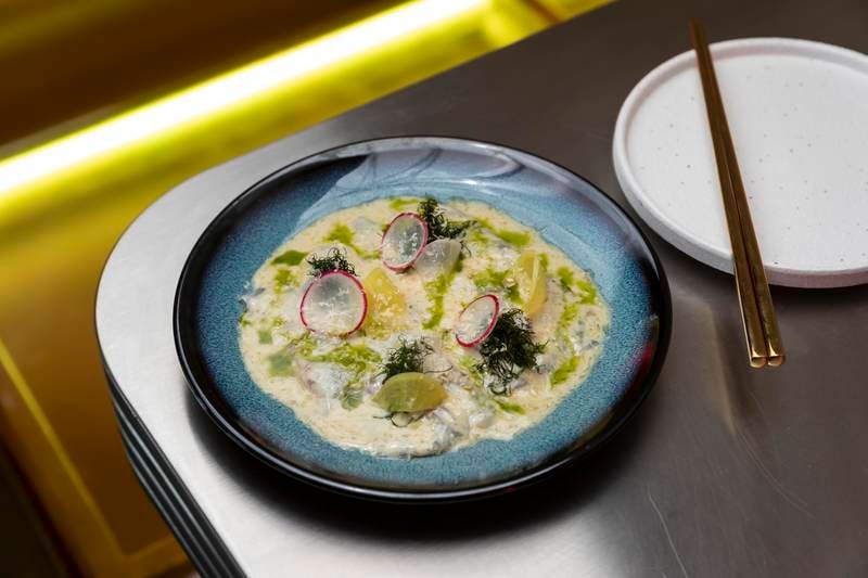 The New Port seabass carpaccio is an example of the venue's forward-thinking Asian menu. Antonie Robertson / The National