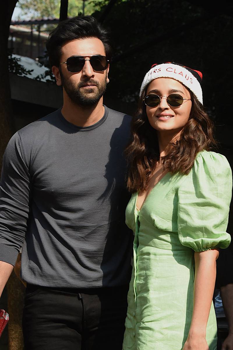 Bollywood stars Ranbir Kapoor and Alia Bhatt arrive for a Christmas Day brunch in Mumbai in 2020. AFP