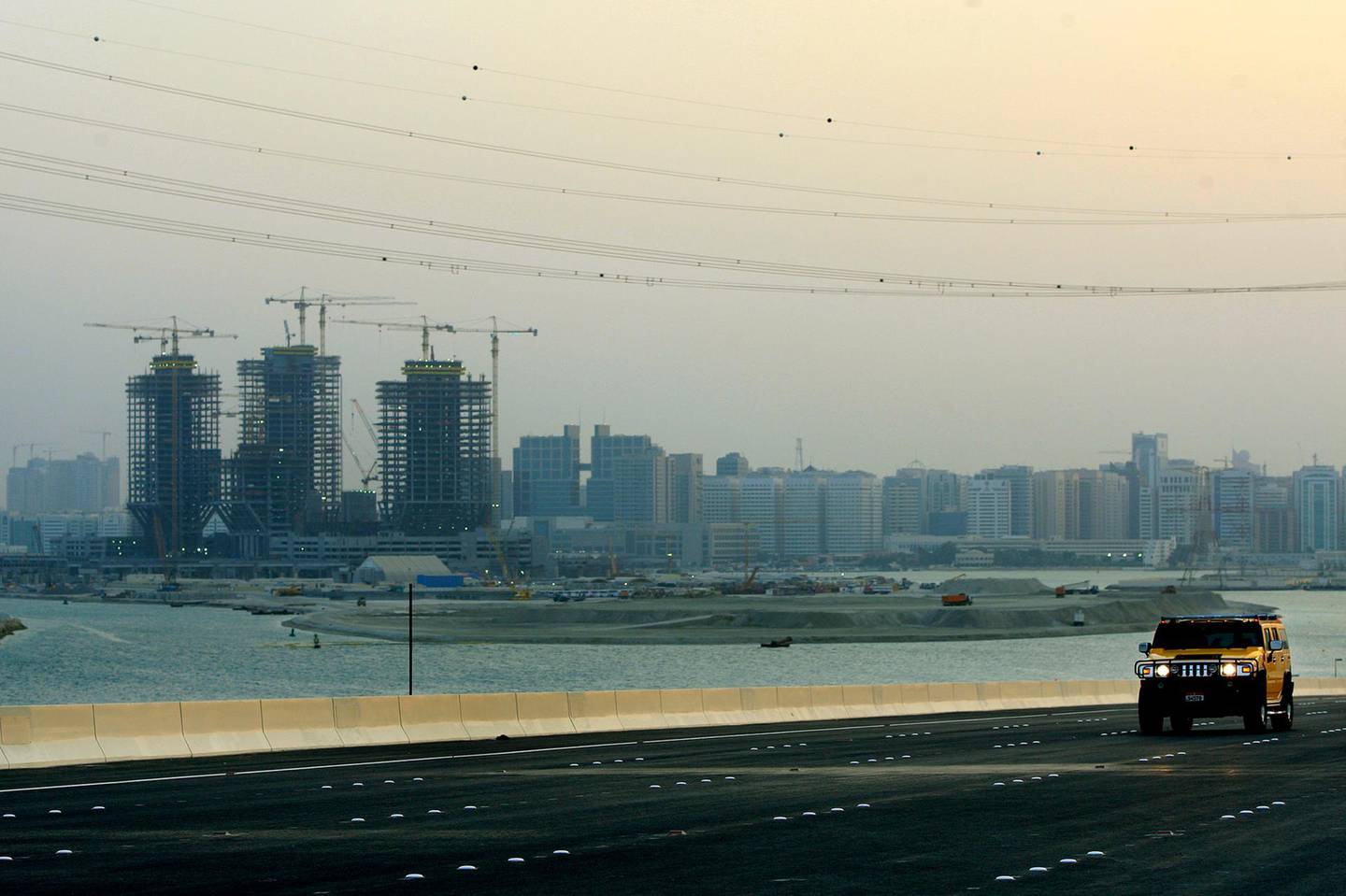 October 14, 2009 -- Abu Dhabi -- Sheikh Khalifa Bridge opened Wednesday, Oct 14th, 2009, allowing cars a new route off and on the island of Abu Dhabi, connecting Abu Dhabi and Saadiyat Islands and opening the Shahama-Saadiyat Highway.  (Rich-Joseph Facun / The National)  *** Local Caption ***  rjf-1014-saadiyatbridge017.jpg