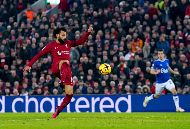 Mohamed Salah scores Liverpool's first goal against Everton. PA