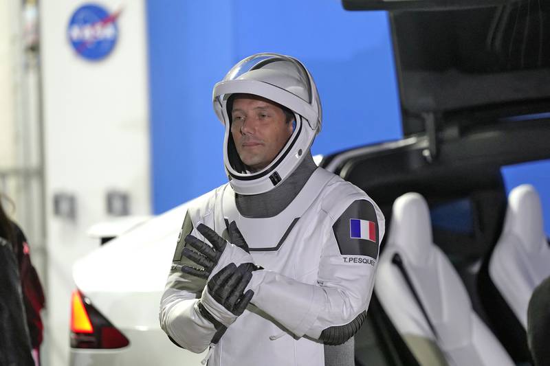 Thomas Pesquet of France talks to family and friends before a launch attempt at the Kennedy Space Centre in April 2021 in Cape Canaveral, Florida. AP Photo