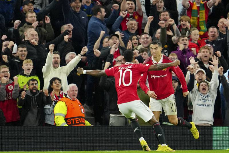 Manchester United's Cristiano Ronaldo celebrates with Marcus Rashford after scoring the third goal in the 3-0 Europa League win against Sheriff at Old Trafford  on October 27, 2022. AP
