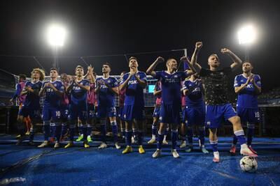 Dinamo Zagreb players acknowledge the fans after their victory. Getty