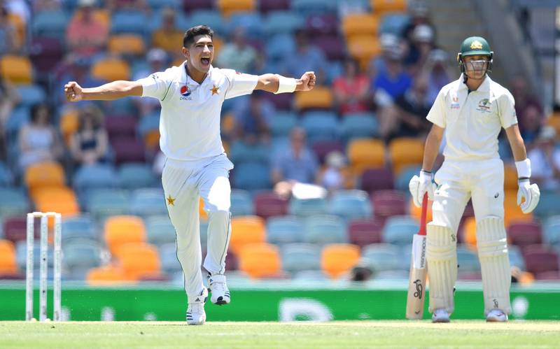 Pakistan's 16-year-old bowler Naseem Shah celebrates getting  his first Test wicket, Australian David Warner,  at the Gabba. EPA