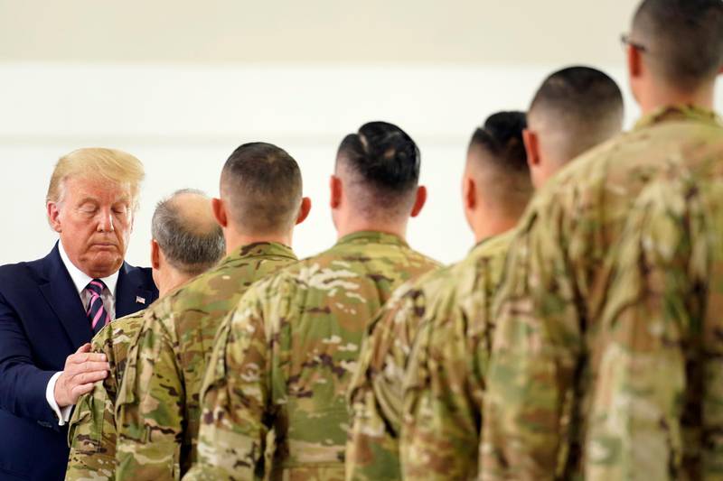 President Donald Trump participates in a ceremony recognising the California National Guard at Sacramento McClellan Airport. AP Photo
