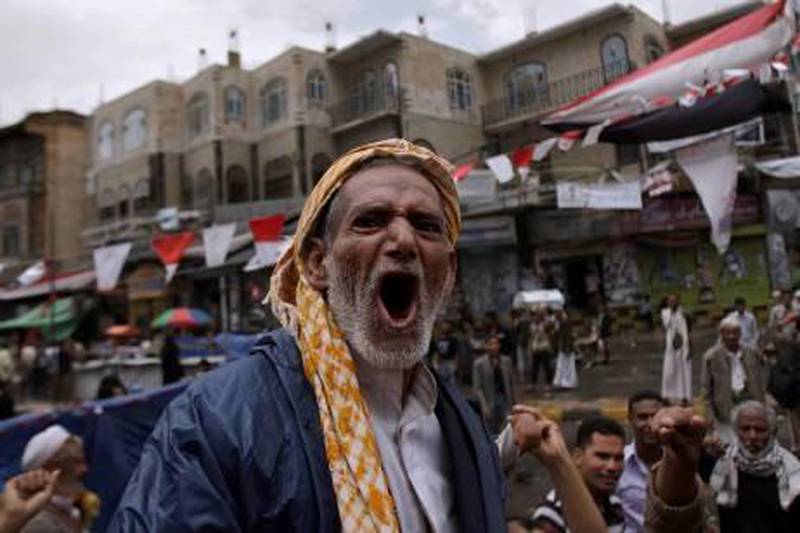 An elderly anti-government protestor, shouts slogans during a demonstration demanding the resignation of Yemeni President Ali Abdullah Saleh, in Sanaa, Yemen, Sunday, June 12, 2011. (AP Photo/Hani Mohammed) *** Local Caption ***  XMM133_Mideast_Yemen.jpg