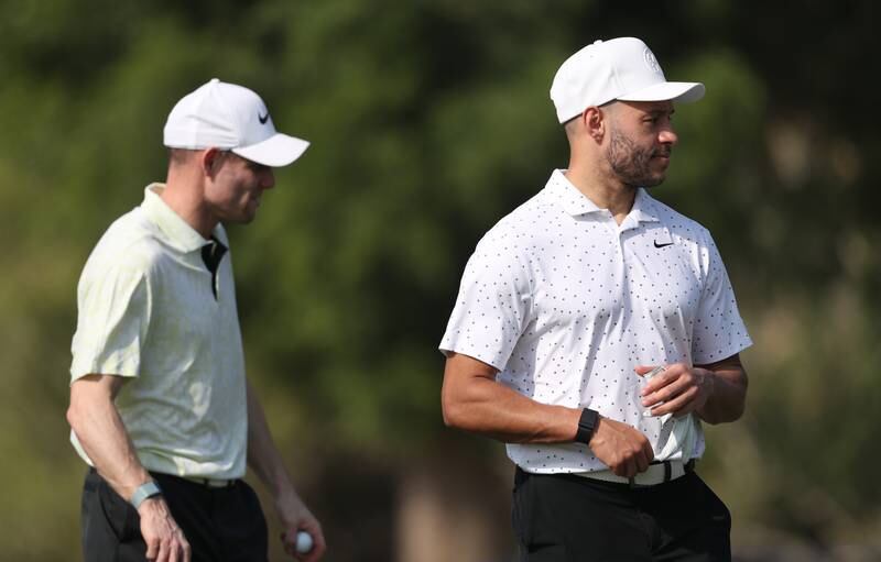 Alex Oxlade-Chamberlain and James Milner at Emirates Golf Club. Getty