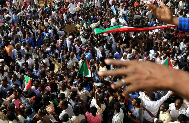Sudanese demonstrators attend a protest rally. Reuters
