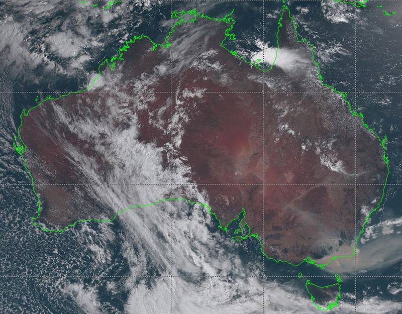 A satellite image taken on January 3, 2020, from the Japan Meteorological Agency shows an image from the Himawari-8 satellite of Australia, with smoke from bushfires visably drifting off the coast of southeast New South Wales. AFP
