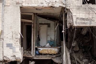 A bathtub is seen inside a building that was heavily damaged by shelling in Kharkiv. Reuters