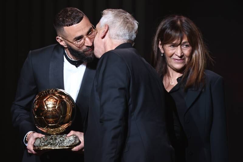 Karim Benzema of Real Madrid kisses his father Hafid Benzema next to his mother Wahida Djebbara. EPA