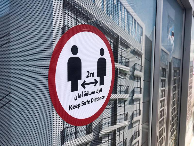 Dubai, United Arab Emirates - Reporter: N/A. Business. General view of a Safe distance sign at a bus station. Tuesday, July 21st, 2020. Dubai. Chris Whiteoak / The National