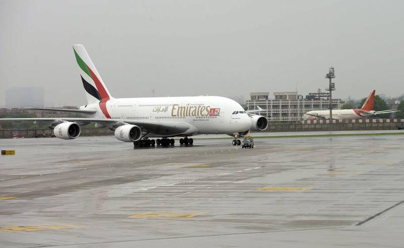 An Emirates A380 taxis after touchdown at the Indira Gandhi international airport in New Delhi. Raveendran / AFP
