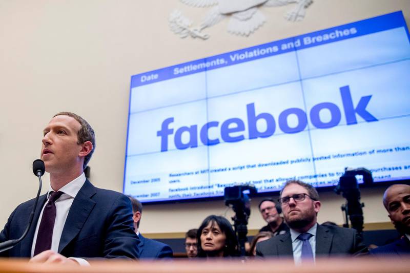 FILE - In this Oct. 23, 2019, file photo, Facebook CEO Mark Zuckerberg testifies before a House Financial Services Committee hearing on Capitol Hill in Washington. For years, Facebook has been in a defensive crouch amid a slew of privacy scandals, antitrust lawsuits and charges that it was letting hate speech and extremism destroy democracy. Early Thursday, Feb. 18, 2021, though, it abruptly pivoted to take the offensive in Australia, where it lowered the boom on publishers and the government with a sudden decision to block news on its platform across the entire country. (AP Photo/Andrew Harnik, File)