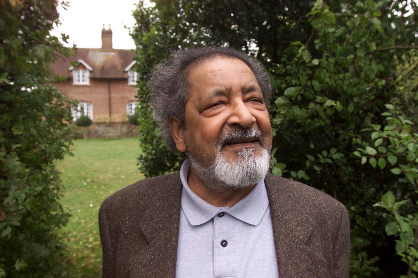 FILE - This 2001 file photo shows British author V.S. Naipaul in Salisbury, England. The Trinidad-born Nobel laureate whose celebrated writing and brittle, provocative personality drew admiration and revulsion in equal measures, died Saturday, Aug. 11, 2018, at his London home, his family said. He was 85. (Chris Ison/PA via AP)