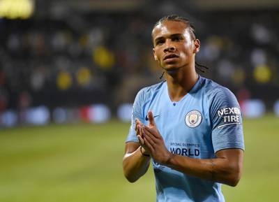 Manchester City midfielder Leroy Sane looks to the crowd at the end of a soccer match against Borussia Dortmund at an International Champions Cup tournament, Friday, July 20, 2018, at Soldier Field in Chicago. (AP Photo/Annie Rice)