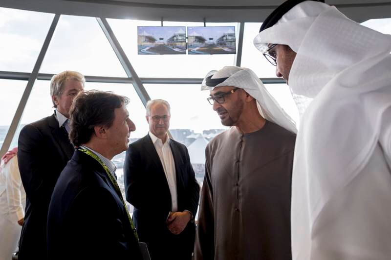 President Sheikh Mohamed and Dr Sultan Al Jaber, Minister of Industry and Advanced Technology, managing director and group chief executive of Adnoc and chairman of Masdar, with guests at the Grand Prix. Photo: Ryan Carter / UAE Presidential Court