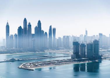 DUBAI, UNITED ARAB EMIRATES. 18 JANUARY 2021. Dubai skyline seen from St Regis hotel on the Palm Jumeirah. (Photo: Reem Mohammed/The National) Reporter: Section: