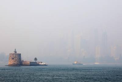 Smoke shrouds Fort Denison in Sydney. Getty Images