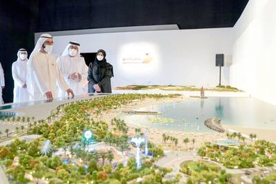 Sheikh Mohammed bin Rashid, Vice President and Ruler of Dubai, reviews plans for a beach-side development. Courtesy: Dubai Media Office