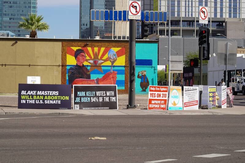 Democratic election posters in downtown Phoenix, Arizona. The race for governor and senate are neck and neck. Willy Lowry / The National