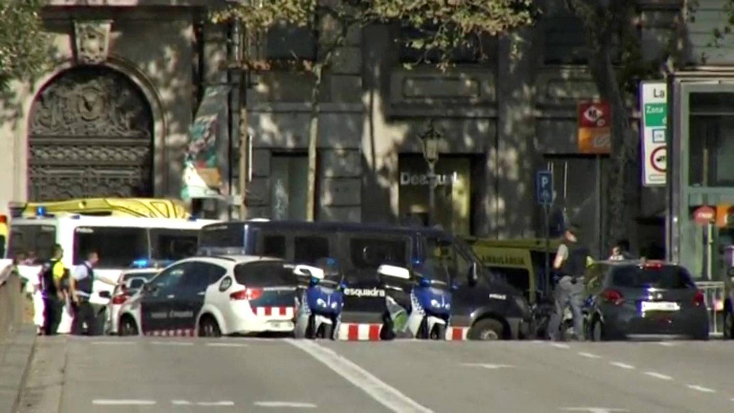 A still image from video shows a police cordon on a street in Barcelona, Spain following a van crash August 17, 2017.  REUTERS TV via REUTERS