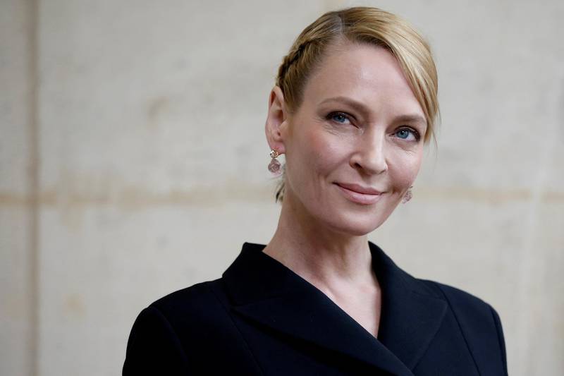 FILE PHOTO: Actress Uma Thurman poses during a photocall before the French fashion house Christian Dior Fall/Winter 2017-2018 women's ready-to-wear collection during Fashion Week in Paris, France, March 3, 2017. REUTERS/Gonzalo Fuentes/File Photo
