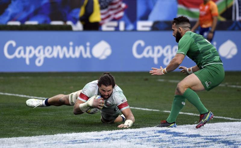 CARSON, CA - MARCH 01: Danny Barrett #3 of the United States scores a try against Mark Roche #9 of Ireland during 5th Place Play-off of the HSBC World Rugby Sevens Series at Dignity Health Sports Park on March 1, 2020 in Carson, California.   Kevork Djansezian/Getty Images/AFP
== FOR NEWSPAPERS, INTERNET, TELCOS & TELEVISION USE ONLY ==

