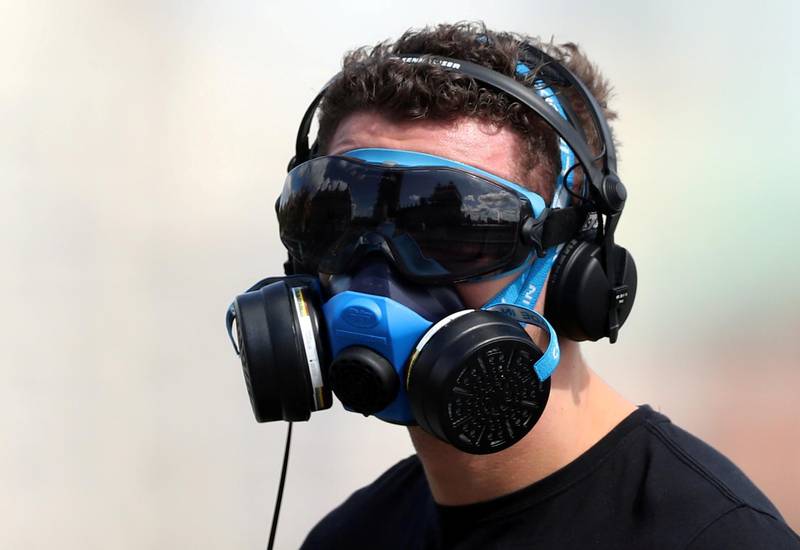 A man wears a protective face mask on Westminster Bridge, as the spread of the coronavirus disease (COVID-19) continues, in London, Britain. REUTERS