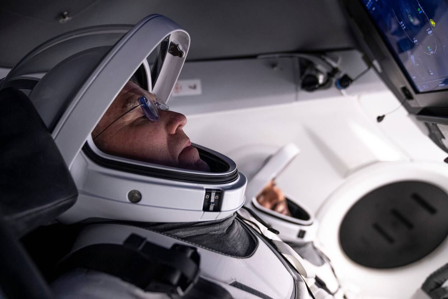 Stephen Bowen inside a Dragon mock-up crew vehicle, taking part in training at the SpaceX base in Hawthorne, California. Photo: SpaceX
