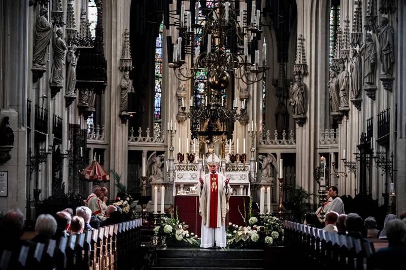 Monsignor Gerard de Korte leads a national memorial service for victims of the global coronavirus pandemic in St John's Cathedral in Den Bosch, The Netherlands.  EPA