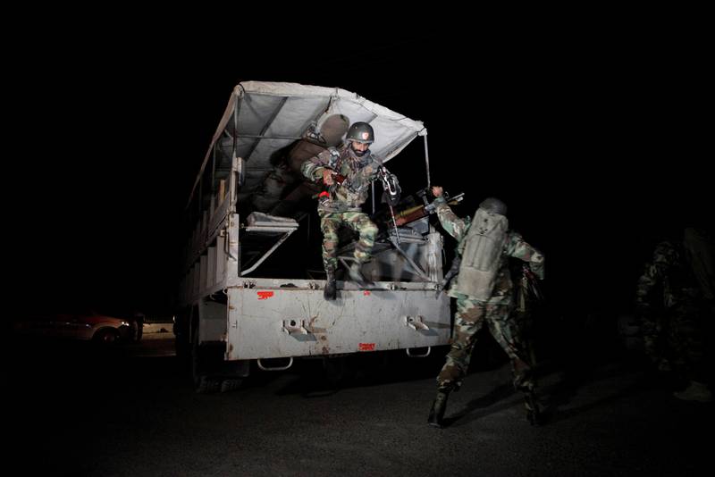 Pakistani troops deploy outside the police training centre in the northern city of Quetta on October 25, 2016 following an attack on the building. Naseer Ahmed / Reuters