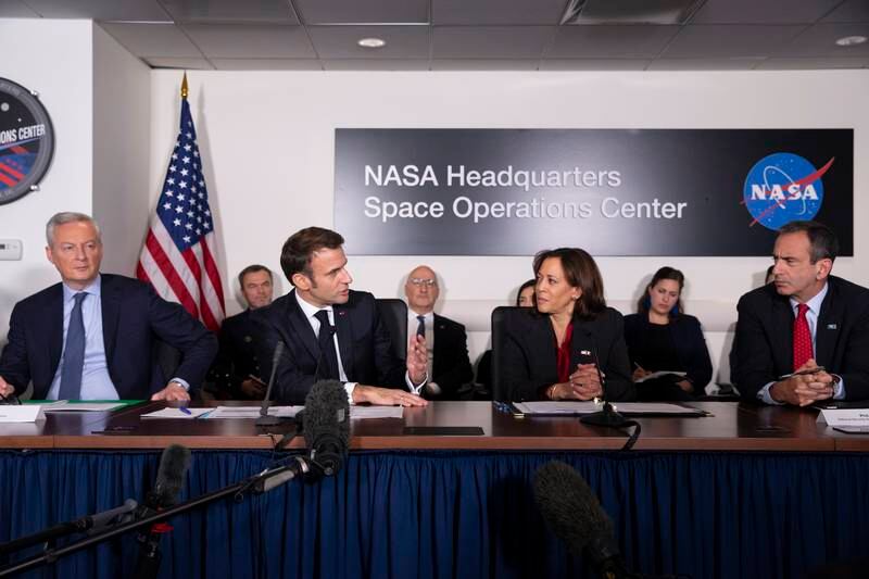 From left, French Minister for Economy, Finance, Industry and Digital Security Bruno Le Maire; Mr Macron; US Vice President Kamala Harris; and National Security Adviser to the Vice President Phil Gordon during a meeting at Nasa headquarters to highlight space co-operation. EPA