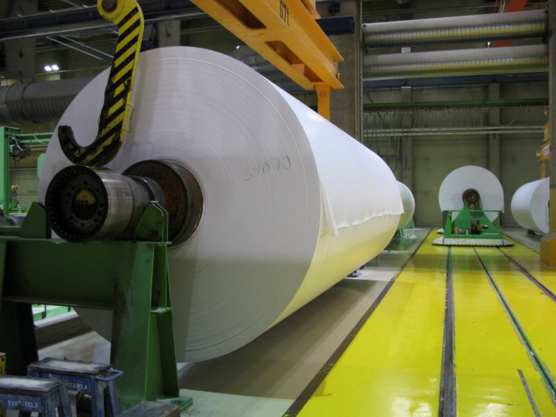 Magazine paper rolls at a Finnish paper mill where strikes have halted production. Reuters