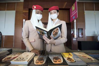 Duba, United Arab Emirates -  Emirates crew checking Sheikh Mohammed's book  at the Emirates Airline Festival of Literature at InterContentinental Hotel Dubai Festival City.  Leslie Pableo for The National for Razmig's story