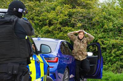 Devon and Cornwall police officers demonstrate armed stop and arrest techniques. Getty Images