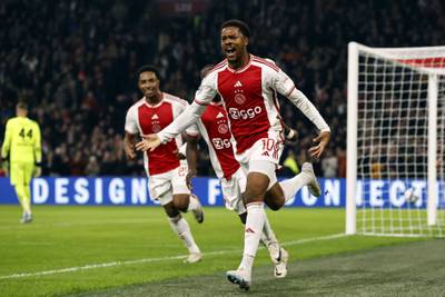 Ajax forward Chuba Akpom celebrates after scoring his team's third goal against Heerenveen on Sunday. AFP