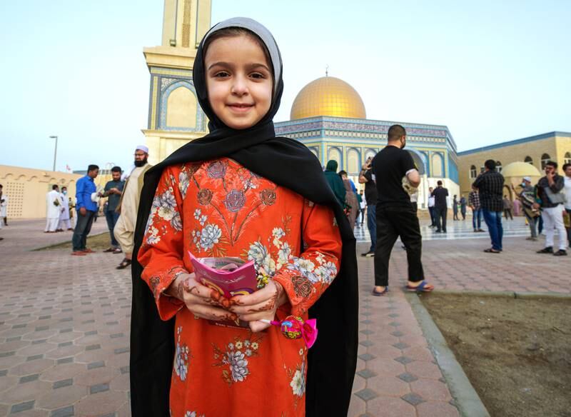 Malek Mohamed, 7, after Eid prayers with her candies and Eid gift.Victor Besa / The National