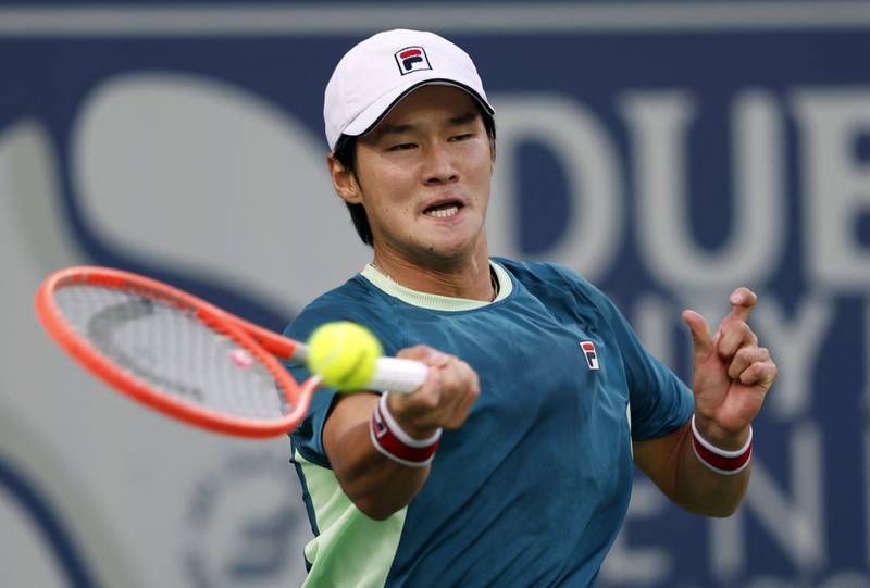 Soonwoo Kwon hits a forehand to Andrey Rublev. Reuters