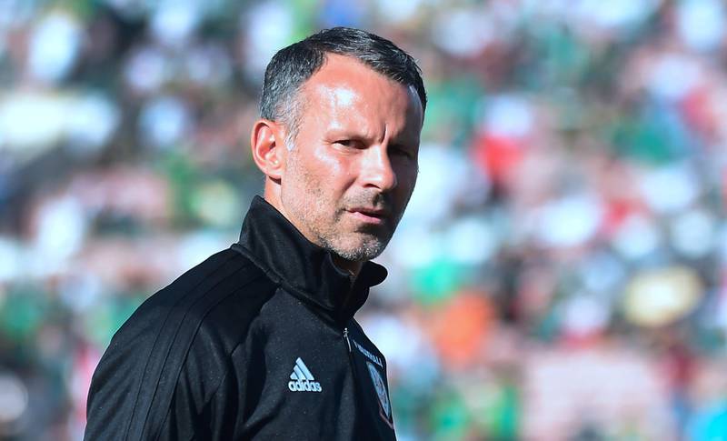 Wales coach and former Manchester United star Ryan Giggs walks off the pitch prior to kickoff against Mexico in an international football friendly at the Rose Bowl in Pasadena, California on May 28, 2018 where the game ended 0-0.  / AFP / Frederic J. BROWN
