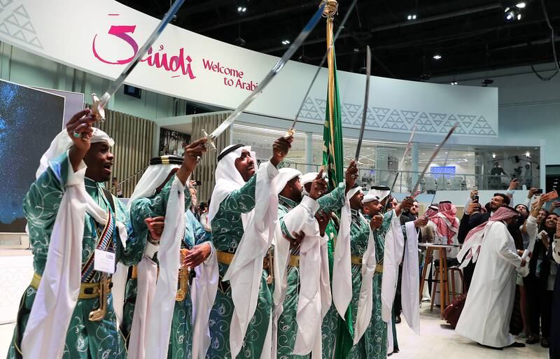 Performers dance at the Saudi Arabia stand on the second day of the Arabian Travel Market. Pawan Singh / The National