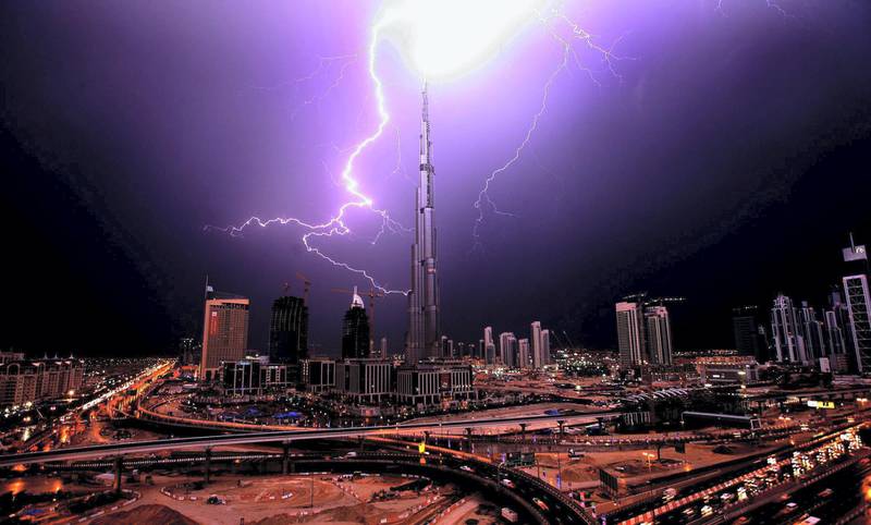 DUBAI-JANUARY 14,2009 - Web of lightning form over the Burj Dubai Wednesday evening. ( Paulo Vecina/The National ) *** Local Caption ***  PV Lightning.jpg