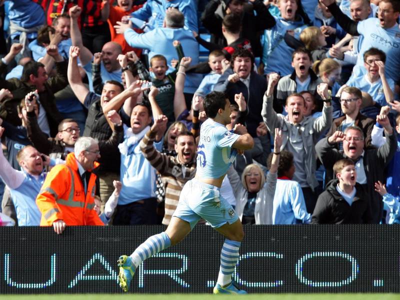 Manchester City's Sergio Aguero celebrates scoring the match-winning goal against QPR. PA
