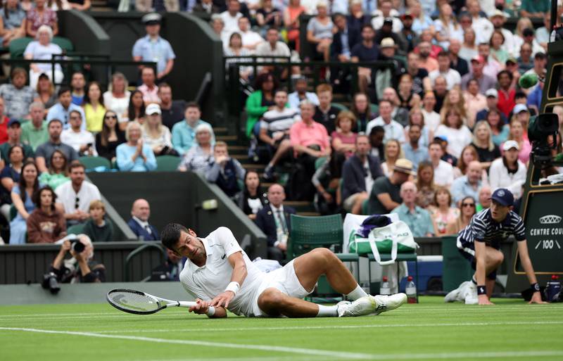 Novak Djokovic takes a tumble against Kwon Soon-woo. Reuters
