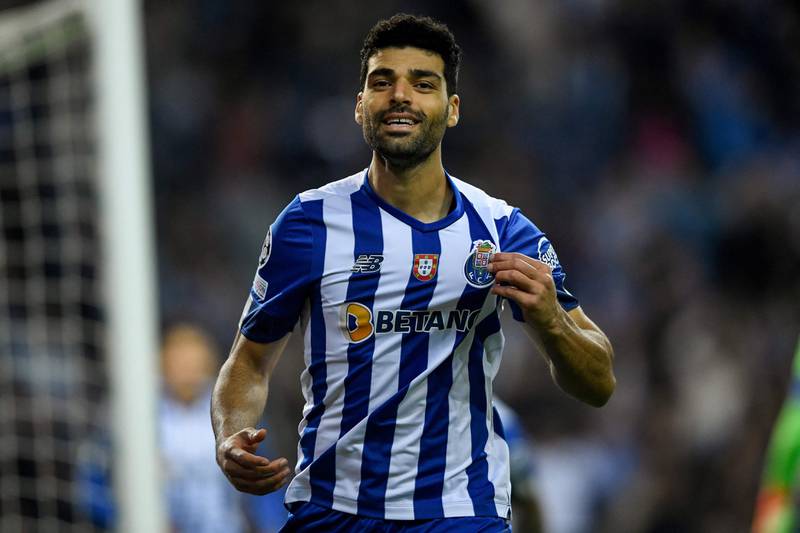 Porto's Iranian forward Mehdi Taremi celebrates after scoring the first goal in the 2-1 Champions League win against Atletico Madrid at the Dragao stadium in Porto, on November 1, 2022. AFP