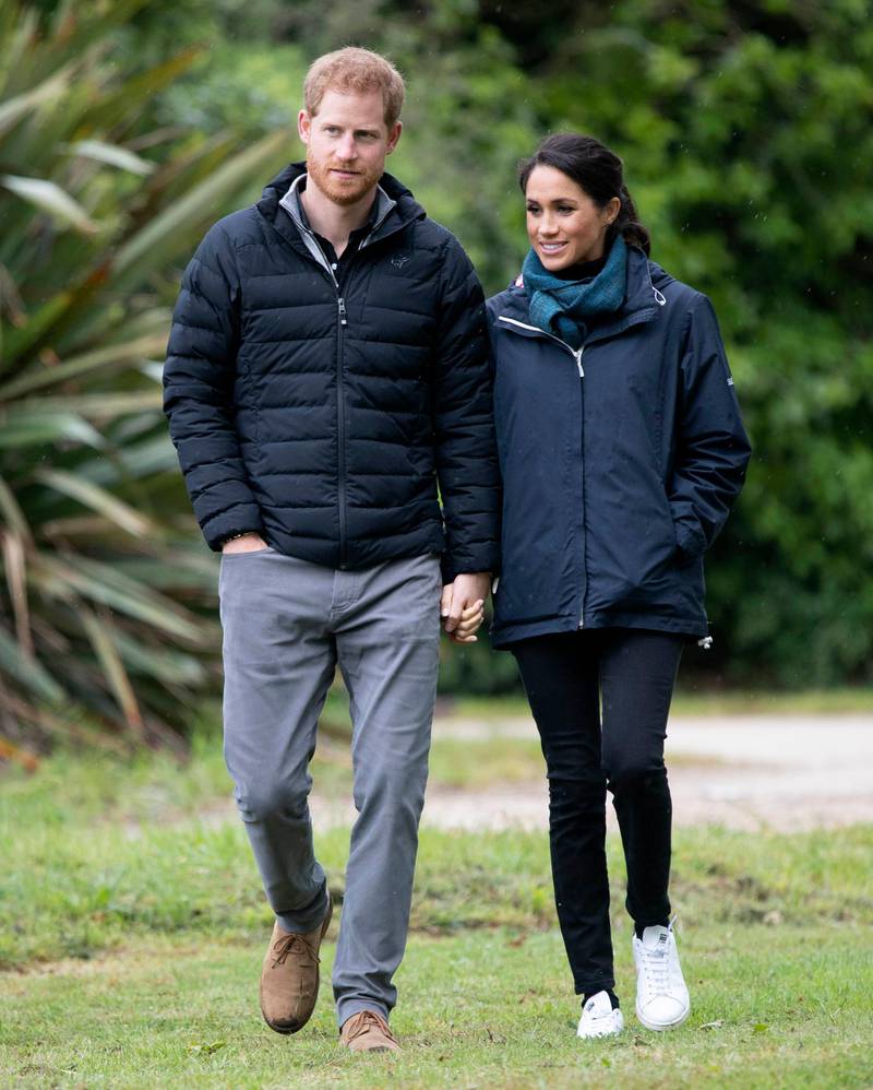 She chose a Seasalt Cornwall navy rain jacket, Outland Denim jeans and Stella x Adidas sneakers for a walk around Abel Tasman National Park in New Zealand on day 14 of their 16-day tour of Australia and the South Pacific.